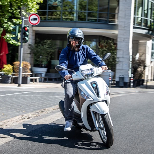 Moto přilba s headsetem SENA Outstar S matná černá